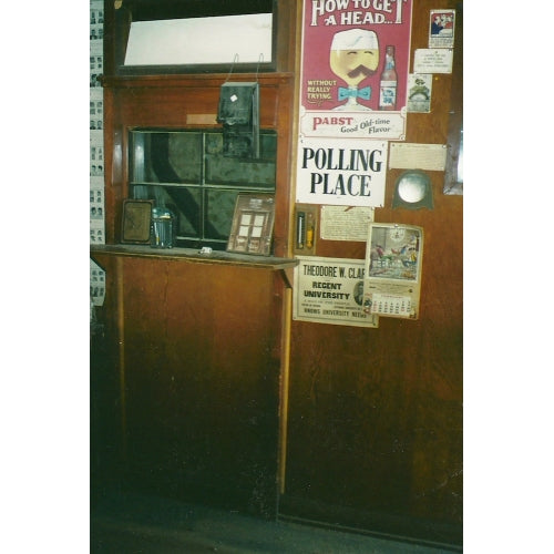 The window of the Gold Point post office looks much the same as when the office closed in 1964,