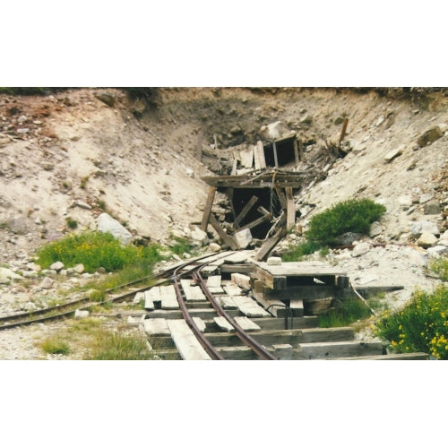 The tracks lead into the lower adit of the May Lundy mine in this August 1999 photo.
